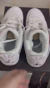 This is the left shoe of Jordan 4 Retro Pure Money.